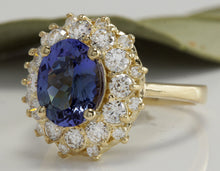 Load image into Gallery viewer, 3.80 Carats Natural Very Nice Looking Tanzanite and Diamond 14K Solid Yellow Gold Ring