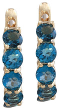 Load image into Gallery viewer, Exquisite Top Quality 2.60 Carats Natural London Blue Topaz 14K Solid Yellow Gold Huggie Earrings